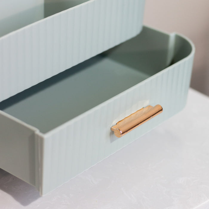 Rotating cosmetics organiser duck egg