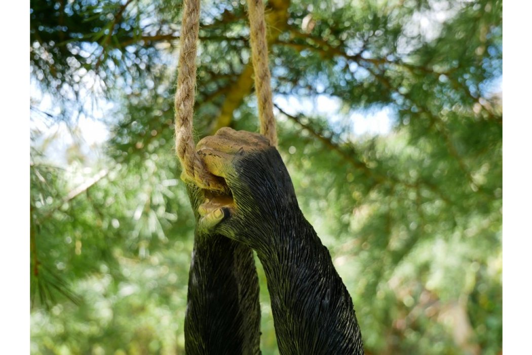 Hanging upside-down monkey ornament